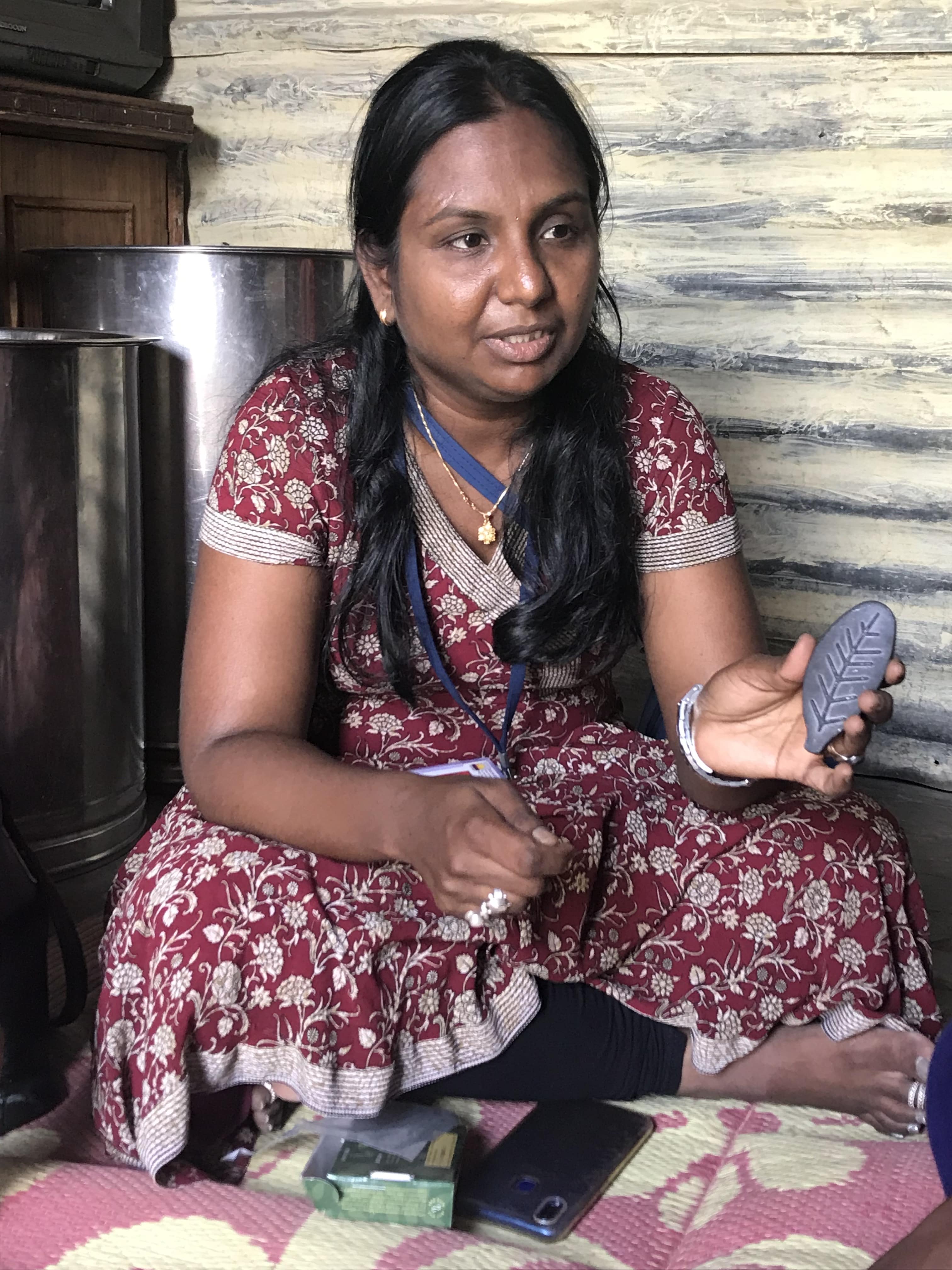 Woman India holding the LUCKY SHAKTI LEAF